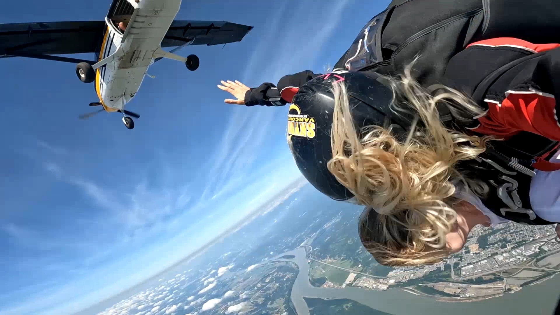 Image of a woman sky diving